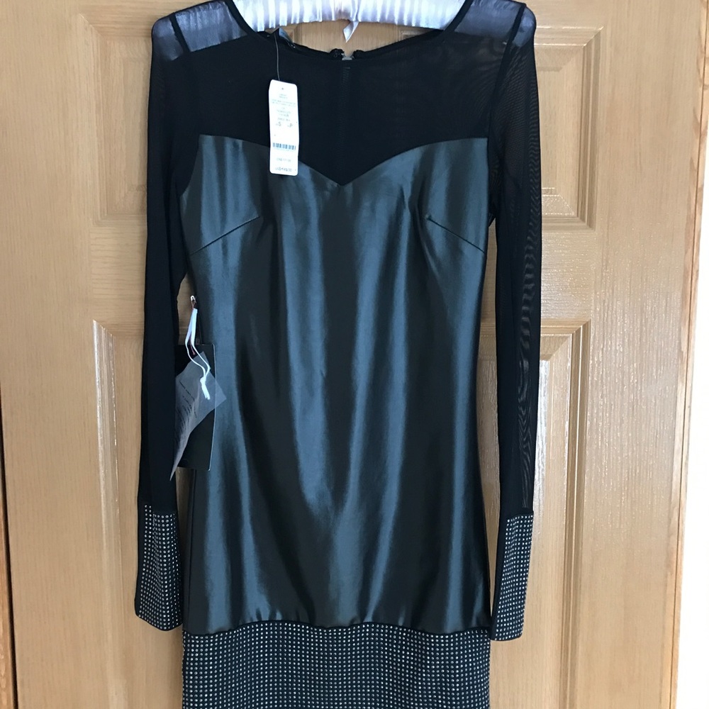 New with tags Bebe black leather long sleeve dress